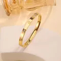 Elegant 18k gold plated stainless steel bangle with sparkling zircons and engraved patterns - 15# Diamond-set Screw - Gold Sz668