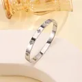 Elegant polished silver titanium steel bangle with sparkling clover-shaped crystal insets - 24# Lucky Clover - Steel Sz460