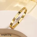 Titanium steel bangle with gold plating featuring screw motifs and 60mm diameter - 52# Gold Screw Sz666