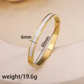 6mm wide gold plated stainless steel bangle with white enamel inlay and 60mm diameter - 85# White Sz550