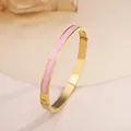 Polished 18k gold plated titanium steel bracelet with pink enamel inlay and side hinge - 86# Pink Sz549