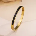 Minimalist 18k gold plated titanium steel bangle with continuous black enamel inlay - 87# Black Sz548