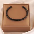 Minimalist black open bangle in 18k gold plated stainless steel with display box - 108# Möbius - Black Sz021