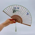 Handcrafted silk folding fan featuring blue orchid embroidery and a green tassel - 2026 Hot Selling Item - Suzhou Embroidery Fan - Fragrance Of Butterflies And Orchids