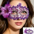 Close-up of purple lace masquerade mask with flower petals and crystal details - Purple