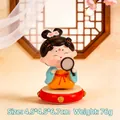 Cute ancient Chinese beauty figurine in green and orange dress on a red drum base - Leisure Lady (1213-14)