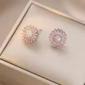 Detailed close-up of sunflower stud earrings with pink and white rhinestones in a gift box - E1304-3