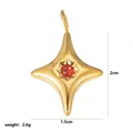 Gold star pendant with red zircon stone including 2cm by 1.5cm dimensions and weight - January Stars