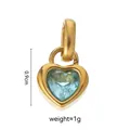 Golden heart pendant with light blue crystal zircon, 0.9cm height and 1g weight detail - March Love