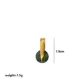 Golden birthstone pendant featuring a dark green faceted crystal, 1.9cm height - August Rotation