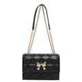 Sac bandoulière matelassé noir chic avec chaîne dorée et fermoir nœud métallique - Noir