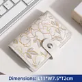 Vintage floral card holder in cream faux leather with 20 slots and embroidery - Noble Camellia