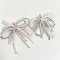 2605082 Pearl Crystal Ribbon Bow Earrings