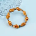Beaded ceramic bracelet with caramel conch beads and blue glazed round accents - 1739-05 Brown Coffee Conch