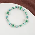 Artistic Jingdezhen ceramic beaded bracelet featuring green flowers and metallic beads - 1750-03 Cherry Blossom Field