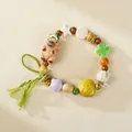 Handmade ceramic bracelet featuring a cute brown capybara charm with colorful beads - Smiling Bear Style (1688-03)