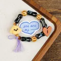 Handmade ceramic bracelet with cute yellow poodle pendant and colorful wooden beads - Chestnut Puppy Style (1730-04)