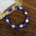 Blue cat-eye stone and floral ceramic beaded bracelet with vintage gold metal accents - Blue and White Porcelain Dream Style (1734-06)