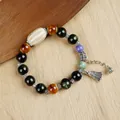 Ethnic ceramic beaded bracelet with obsidian beads and lotus tassel pendant - Fairy Shun Sui Ethnic Tassel Style (6247405830720) / Retro Dark