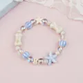 Handmade ceramic star and bone beaded bracelet in light blue and cream colors - Sea Blue Little Star Bone Style (1738-03) / Aqua