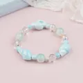 Blue ceramic beaded bracelet with conch seashell charms and iridescent glass pearls - Blue Conch Stripe Style (1738-02) / Blue Conch