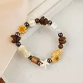 Bohemian Jingdezhen ceramic beaded bracelet featuring coffee beans and starfish charms - Sunny Conch Retro Ocean Style (1741-01) / Coffee Brown