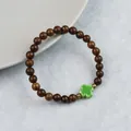 Handmade wooden bead bracelet with a green four-leaf clover ceramic pendant charm - Green Elegant Style (1751-05) / Dark Brown