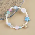 Jingdezhen ceramic bracelet with blue starfish pendant and pastel sea shell beads - Quiet Sea Style (1753-01) / Cream Pastel Purple