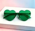 Vibrant translucent green heart-shaped rimless sunglasses for parties and festivals - Kids Heart Green