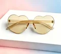 Chic rimless heart shaped sunglasses in translucent jelly brown for men and women - Kids Heart Tea Color