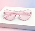 Pink heart-shaped rimless sunglasses with transparent jelly frame for women and men - Kids Heart Light Pink