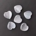 Set of 6 heart-shaped translucent white selenite crystals with cat eye effect on black leather - Light Blue Cat's Eye