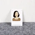 Silver stud earrings displayed on an elegant white card with minimalist female line art - 6x9cm