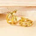 Elegant gold-tone triple layer C-shaped hoop earrings with a polished metallic finish - Triangular Wire Medium Size / Gold