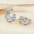 Triple-layered silver C-shaped hoop earrings with a polished metallic finish - Medium Round Wire Medium Size / Silver