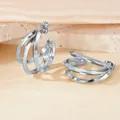 Modern silver C-shape multi-layer earrings with polished triple-layer stacked design - Silver