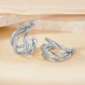 Modern silver C-shaped multi-layer twisted cable hoop earrings with metallic finish - Silver