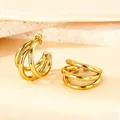 Polished gold multi-layer C-shaped hoop earrings with a triple stacked ring design - Thick Round Wire Medium Size / Gold