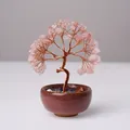 Pink crystal tree ornament with copper wire trunk in a deep red ceramic base - Natural Rose Quartz Tree