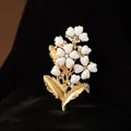 Elegant gold vintage flower brooch with white heart petals and sparkling crystals - White Heart Petal Bouquet Brooch (XZ0310-1)