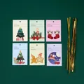 Set of 6 Christmas gift tags with various holiday illustrations and gold metallic ties - Single Gift Tag