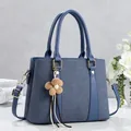 Minimalist fog blue tote bag with patchwork fabric design and flower charm accessory - Royal Blue