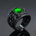 Macro detail of gothic style black titanium ring with a large emerald green gemstone - Black/Green Zirconia
