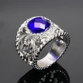 Retro stainless steel ring for men featuring an oval deep blue gemstone and carved textures - Stainless Steel Silver Color Blue Zirconia