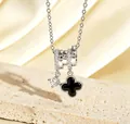 Silver necklace featuring triple-ring pendant with black clover and clear zircon stones - Silver Black Shell