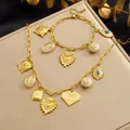 Vintage gold-plated heart and floral jewelry set featuring an elegant necklace and bracelet. - N4284 B2145