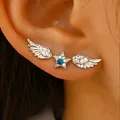 Set orecchini ali d'angelo argento con perno a stella blu e pavé di zirconi chiari - Set di Orecchini Ala Gemma Blu Argento (06 Strati 3 Pz)