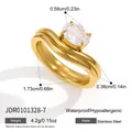 Macro detail view of a gold wavy stainless steel ring with oval zircon and measurements. - Wave Oval Zirconia Ring (JDR0101328-7)