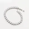 Bracelet tennis argenté avec oxydes de zirconium en cœur et fermoir à rabat - Bracelet / Argenté