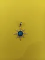 Celestial sunburst pendant with a blue opal center and zircon accents in gold plating - Gold Starburst Sapphire Pendant (Gold+Blue T004)